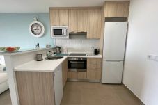 dishwasher, fridge freezer, oven, vitro hob, microwave, coffee machine, kettle.